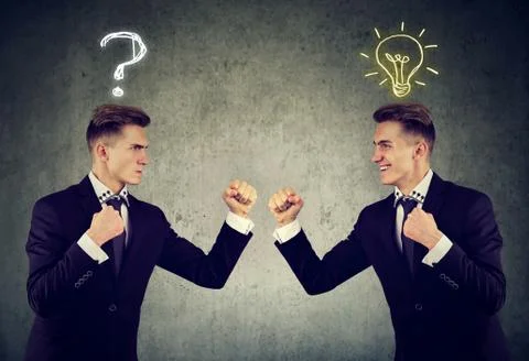 Man with question mark fighting happy guy with bright ideas Stock Photos