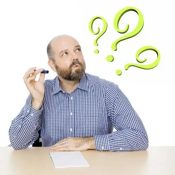 Man with question mark An image of a handsome man with 3 green question ma... Stock Photos