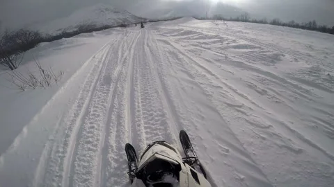 Man quickly rides a snowmobile 스톡 동영상 102206331