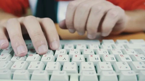 The man quickly typing on a computer keyboard Stock Footage 70170784