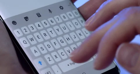 A man is quickly typing a message on a smartphone Video stock 149836645