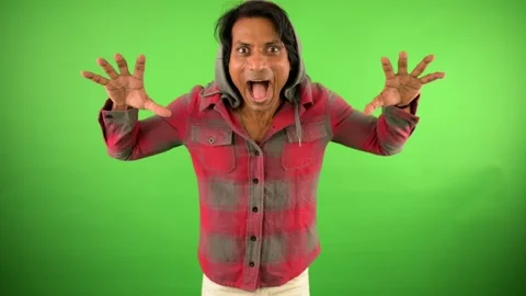 Man raised both hands and mouth wide scaring others Stock Footage 297599202