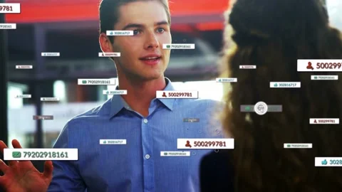 Man raising hand in atrium virtual labels appearing around chest circling ID Stock Footage 332844261