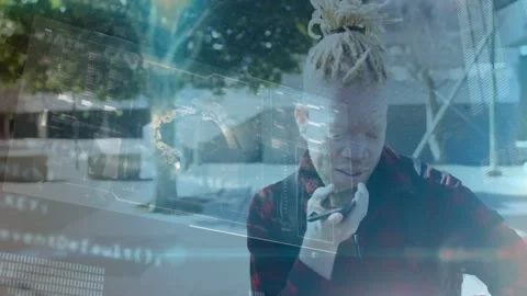Man raising handheld device and speaking in plaza, activating AR HUD, viewing Stock-Footage 331333582