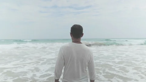 Man Raising Hands At Beach Video stock 109422258