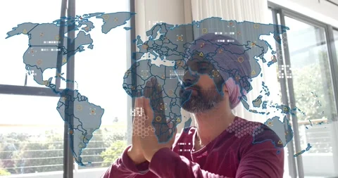 Man raising hands, starting world map overlay and lowering hands as map layering Stock Footage 321301595