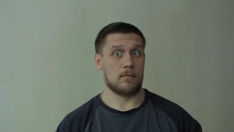 Man raising his brows and rounding eyes. Video stock 77413566