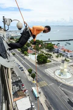  A man rappelling down the Lacerda Elevator. City of Salvador, Bahia, Braz... Fotos de archivo