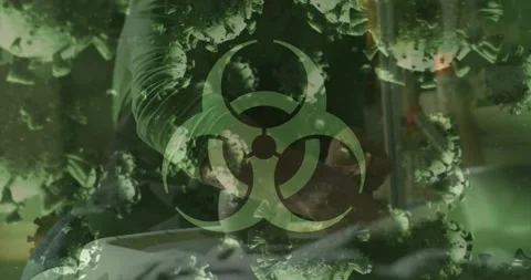 Man reaching into basin, scooping sample for health test while biohazard overlay Stock Footage 321161472