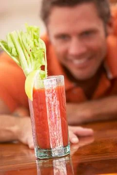 Man Reaching For A Bloody Mary Stock Photos