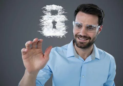 Man reaching for cloud lock graphic against grey background Foto stock