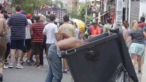 A Man Reaching Out to a Large Trash Stock Footage 118827678