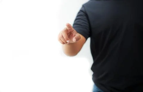 Man reaching out to touch something on a white background Foto stock