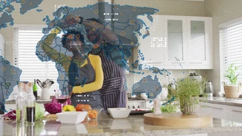 Man reaching partner and activating expanding tech HUD world map overlaying Stock Footage 333004586