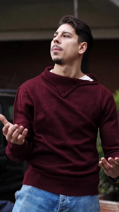 Man reacts remembering something shocking, grabs forehead upset Stock Footage 306677920