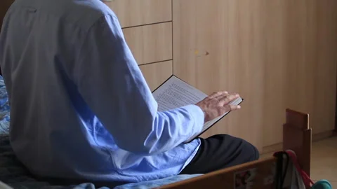 Man read a book Video stock 130530511