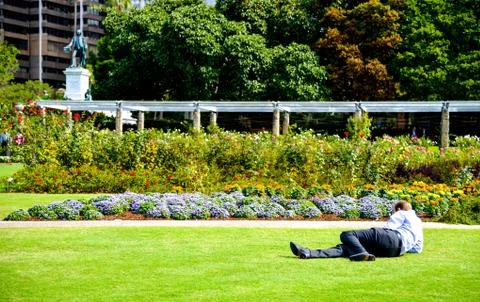 The man read a book in the park Stock Photos