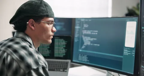 Man, reading and computer screen in office with code, programming and script for Vidéo 346768629