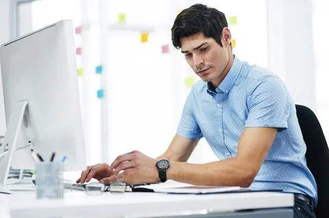 Man, reading and tablet in office with computer, journalist website and news Stock Photos