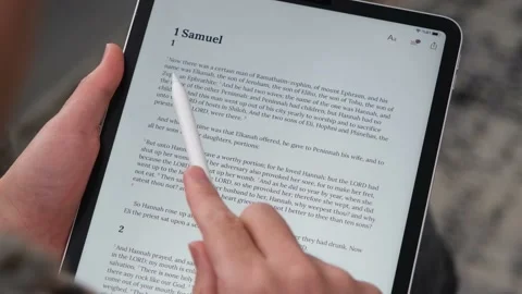 Man reading bible tablet Stock Footage 235916878