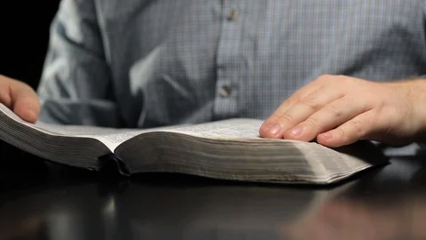 Man Reading Bible Tracking Slider Low Stock Footage 91396192