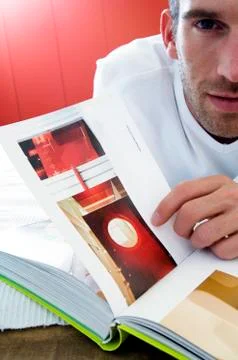 Man reading a book, close-up Stock Photos