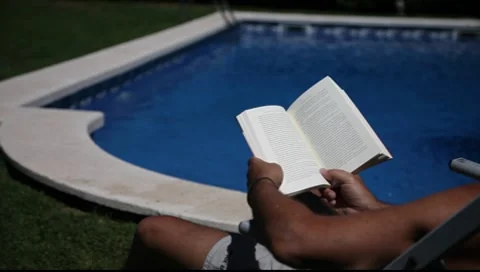 Man reading a book Stock Footage 8687479