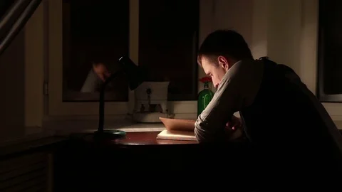 A man reading a book Stock Footage 70246113