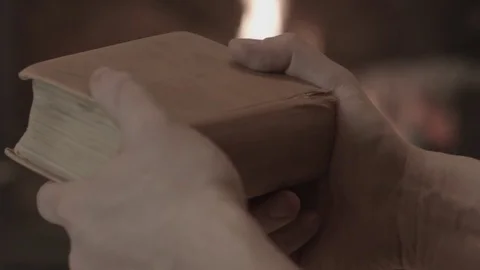 The man is reading a book Stock Footage 74196625