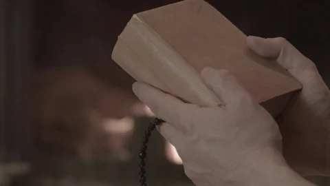 The man is reading a book Stock Footage 74196651