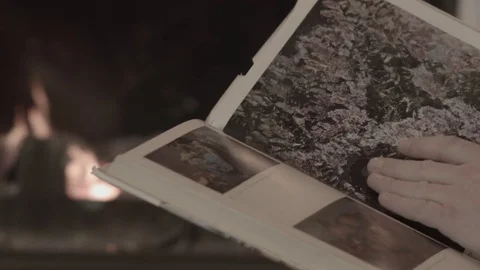 The man is reading a book Stock Footage 74196762