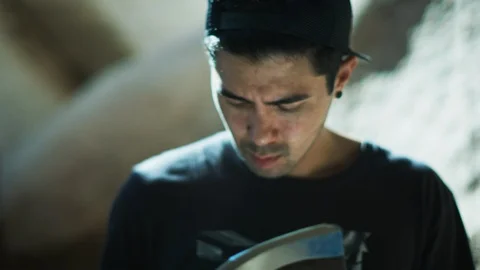 Man reading a book Stock Footage 99752814