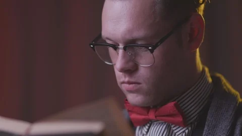 A man is reading a book. Stock Footage 118857722