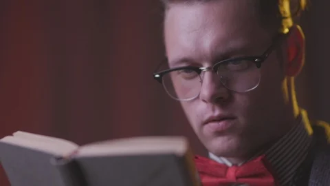 A man is reading a book. Stock Footage 118857730