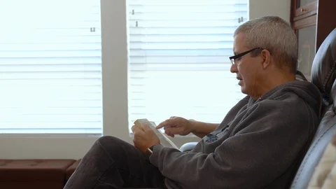 Man Reading Book Stock Footage 127222607