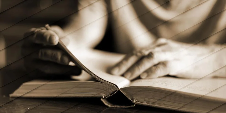 Man reading a book, geometric pattern Stock Photos