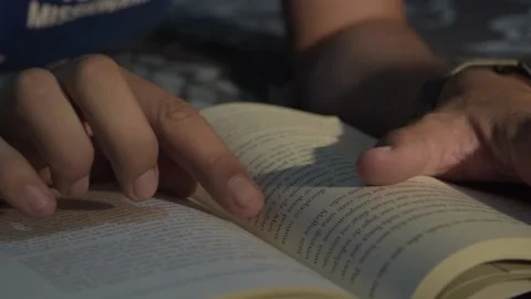 Man reading book in his bed. Reading book before bed. Stock Footage 216190336