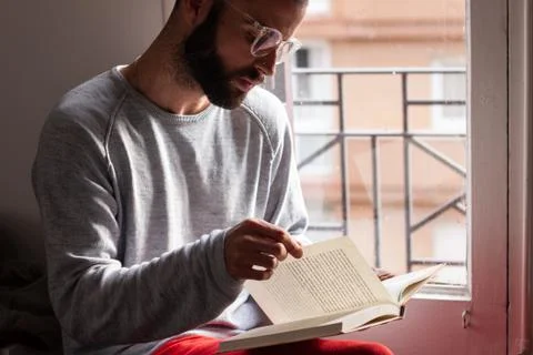 Man Reading a Book Knowledge Relax Concept Stock Photos