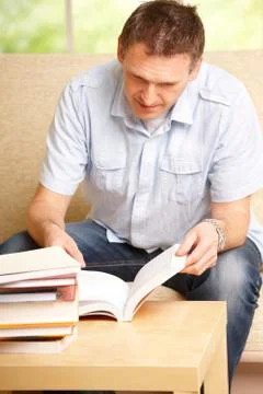 Man reading book Stock Photos