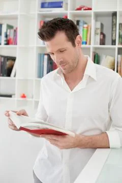 Man reading a book Stock Photos