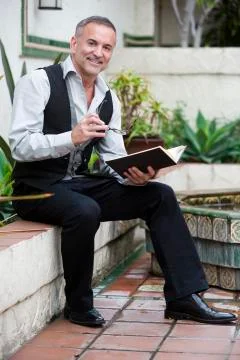 Man reading a book Stock Photos