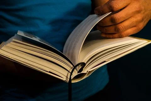 A man is reading a book. Stock Photos