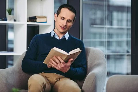 Man reading the book Stock Photos