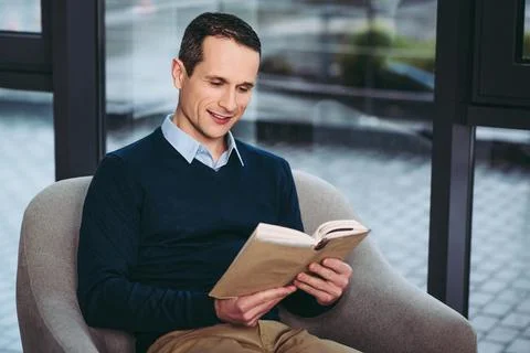 Man reading the book Stock Photos