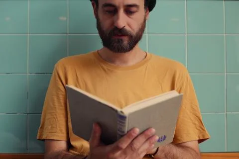 Man reading a book Stock Photos