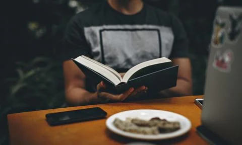 Man reading a book Stock Photos
