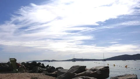 Man reading a book by the sea Stock Footage 80024640