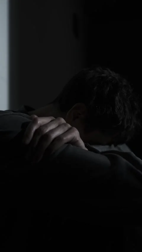 Man reading breakup message on phone at night, pain and digital heartbreak Video stock 320786181