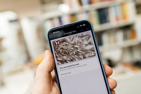Man Reading 'Card Cannot Be Used' Notification on iPhone Stock Photos