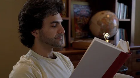 Man Reading Stock Footage 99483116